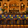 Mexican sun and moon tile mix adding handcrafted color to a restaurant bar front