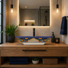 Navy floral talavera vessel rectangular sink above countertop in a modern bathroom with neutral palette and clean design