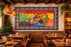 Mexican talavera tile mural serenade scene installed as a kitchen backsplash highlighting bold colors and handcrafted character
