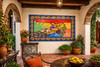 Mexican talavera tile mural serenade scene used in a Spanish Revival interior with traditional architecture and tilework