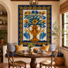 Talavera birds and floral vase mural in a breakfast nook with wood furniture and natural light.