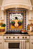 Calla lilies figurative talavera tile mural displayed in a kitchen as a handcrafted focal wall with warm color presence
