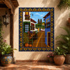 Mexican tile mural with Spanish colonial village on a hacienda patio with tile floors and pottery.