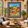 Mexican tile mural with colonial village in a bright rustic sunroom with natural wood accents.