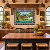 Volcano horses Mexican tile mural displayed in a ranch house kitchen with rustic Mexican styling.