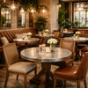 Round zinc tabletops in a rustic cafe