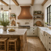 Wall-mount hammered copper bell range hood in a bright farmhouse kitchen with painted cabinetry and oak