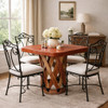 Square equipal table with pigskin leather top in an elegant dining room with wrought iron chairs