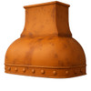 Dome shape copper range hood angled view, rounded hammered canopy with warm patina and smooth curved silhouette