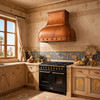 Bright Egyptian style kitchen with window, featuring a dome bell copper range hood with riveted apron above black range, gold and lotus motifs