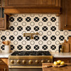 Mexican talavera cobalt floral relief tile installed as kitchen backsplash with strong embossed depth