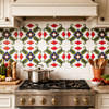 Mexican talavera floral scroll relief tile installed as a kitchen backsplash adding texture depth and handcrafted character