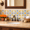 Mexican talavera relief tile floral diamond used on a bathroom vanity wall adding texture and artisanal character
