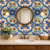 Mexican relief tile blue floral medallion design featured behind bathroom vanity with bold raised floral relief