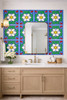 Talavera relief tile white floral medallion used on a bathroom wall adding depth and handcrafted character