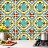 Mexican floral rosette talavera relief tile installed on a kitchen wall creating a bold handcrafted focal surface