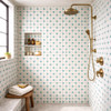 Mexican talavera relief tile turquoise dot grid featured on a shower wall highlighting raised geometry and solid color design