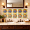 Talavera diamond fleur cross relief tile installed on a bathroom vanity wall highlighting depth