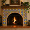 Talavera rounded cross mexican relief tile decorative framing a fireplace with bold color contrast and handcrafted raised design