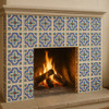 Mexican relief tile blue cross with white border 6x6 pattern decorating a fireplace surround in a spacious living room