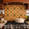 Talavera baroque cross scroll relief tile design installed as a kitchen backsplash using properly scaled four by four inch tiles