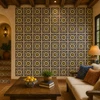 Mexican relief tile yellow medallion floral featured as a vibrant accent wall in a warm interior space