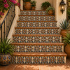 Mexican relief tile floral terracotta decorating stair risers with traditional talavera floral design