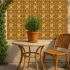 Mexican relief tile interlaced curves patio wall featuring vibrant turquoise and terracotta relief tile design
