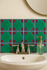 Mexican talavera relief tile emerald adding handcrafted detail and strong relief texture to a bathroom