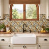 Talavera Floral Scroll Tile with Turquoise Design on kitchen backsplash beneath arched window with farmhouse sink