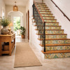 Talavera Floral Scroll Tile with Turquoise Design installed on stair risers in Mediterranean hallway with wood steps