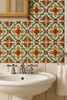 Mexican talavera relief tile colonial adding ornate raised detail and warm tones to a bathroom space