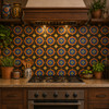 Mexican 4x4 inch relief tiles black orange star design installed on a kitchen backsplash wall