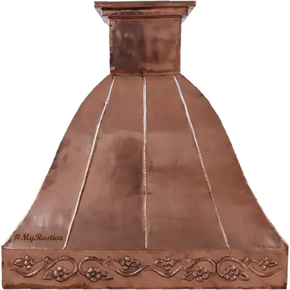 Polished copper range hood with Rococo apron design