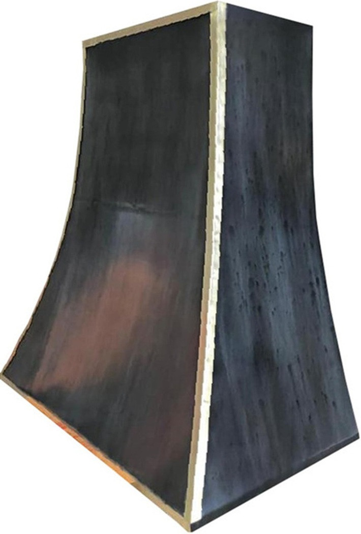 Sculpted black zinc range hood with copper straps, right side view