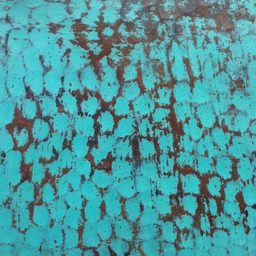 Octagonal green copper tabletop patina close up