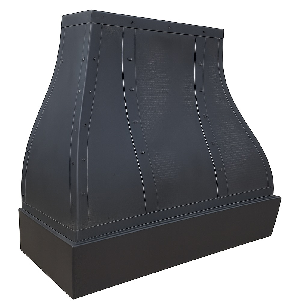 Dark hammered zinc range hood for rustic kitchen with rounded canopy, riveted straps, and deep apron