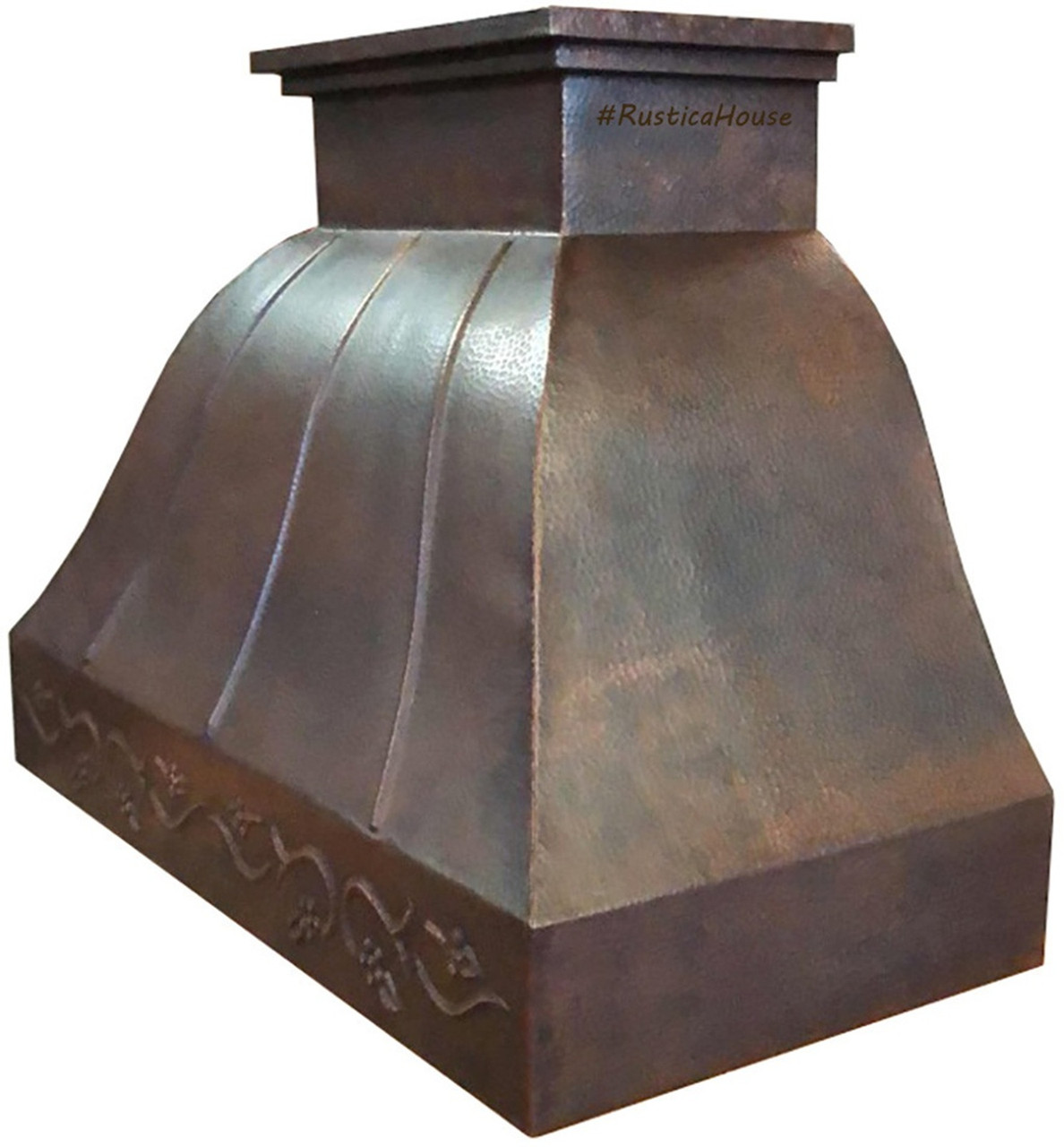 Side view of hand hammered bell-shaped copper range hood with coffee patina and grape vine apron on white background