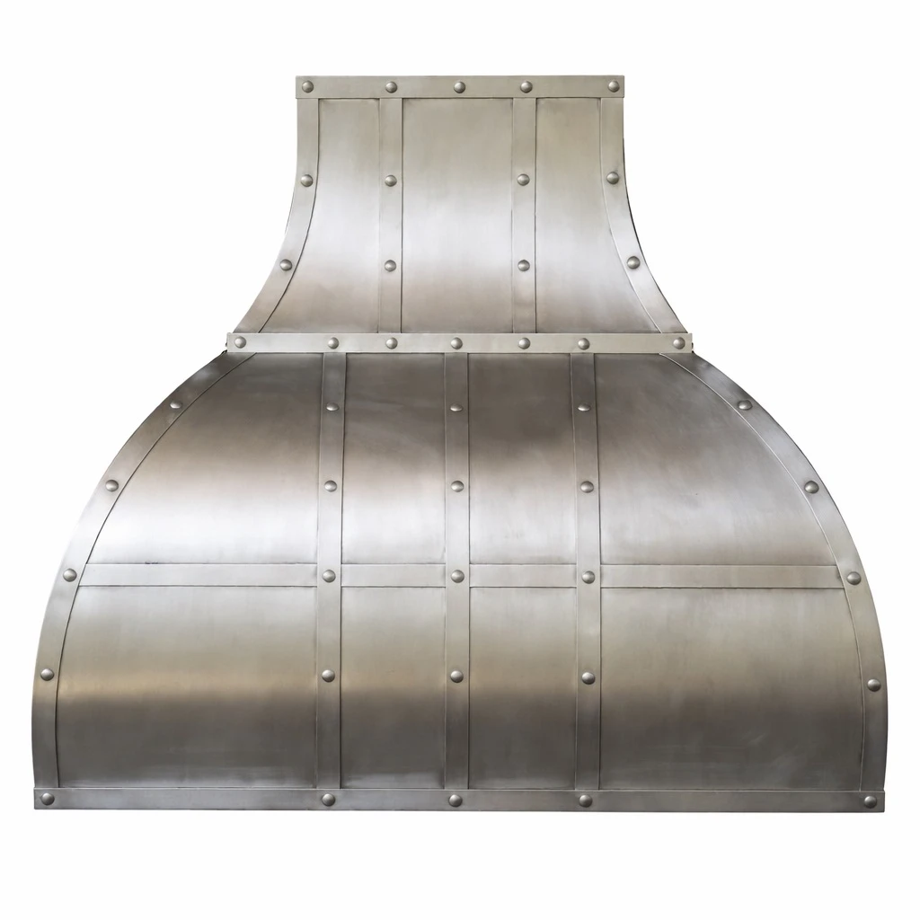 Handcrafted zinc bell range hood with tall chimney, vertical straps, and brushed metal finish