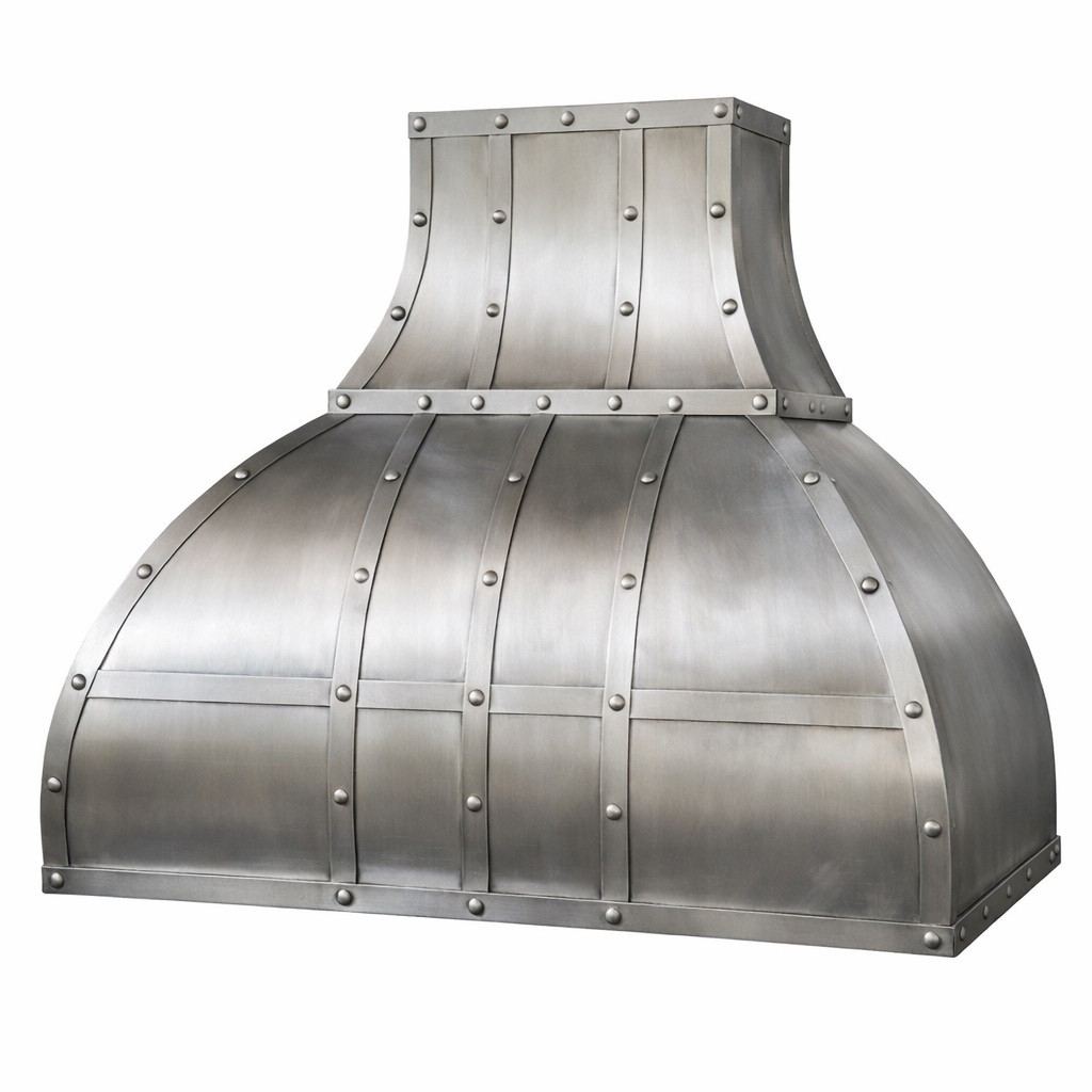 Side view of a handcrafted zinc bell range hood with tall chimney