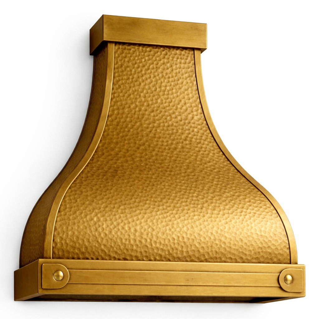 Angled view of handcrafted smooth brass range hood with a horizontal strap and crisp trapezoid silhouette
