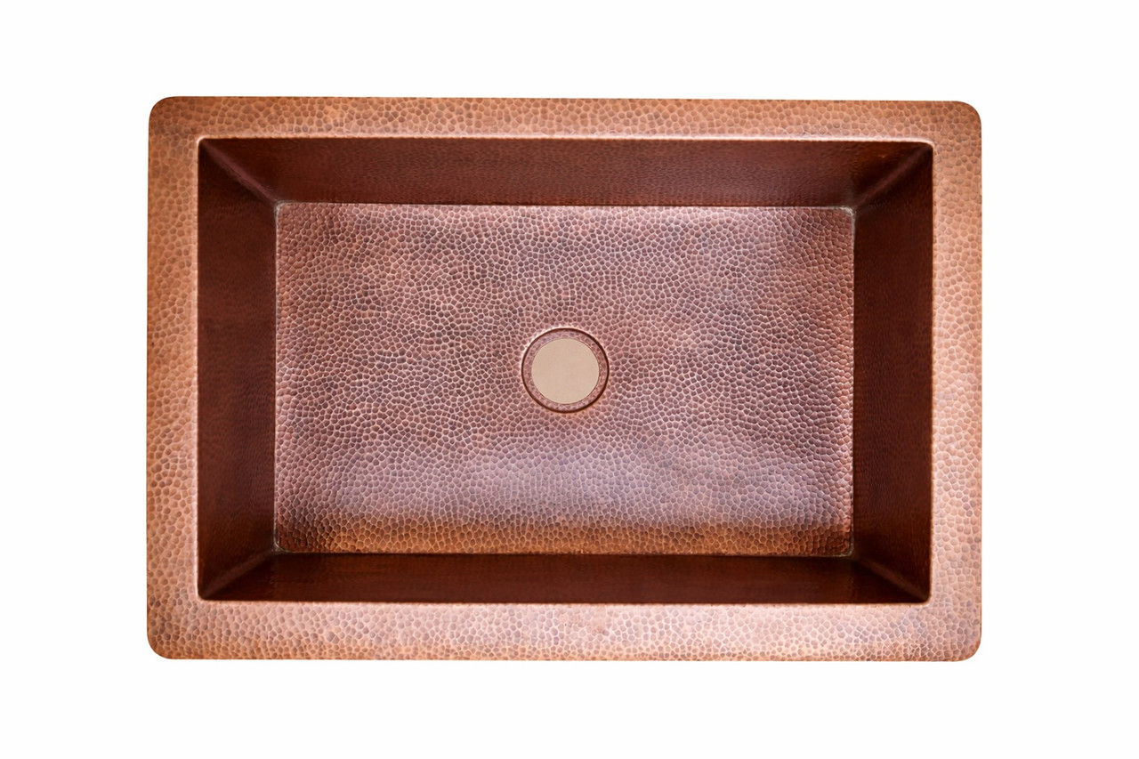 Round apron single bowl hammered copper kitchen sink view from above