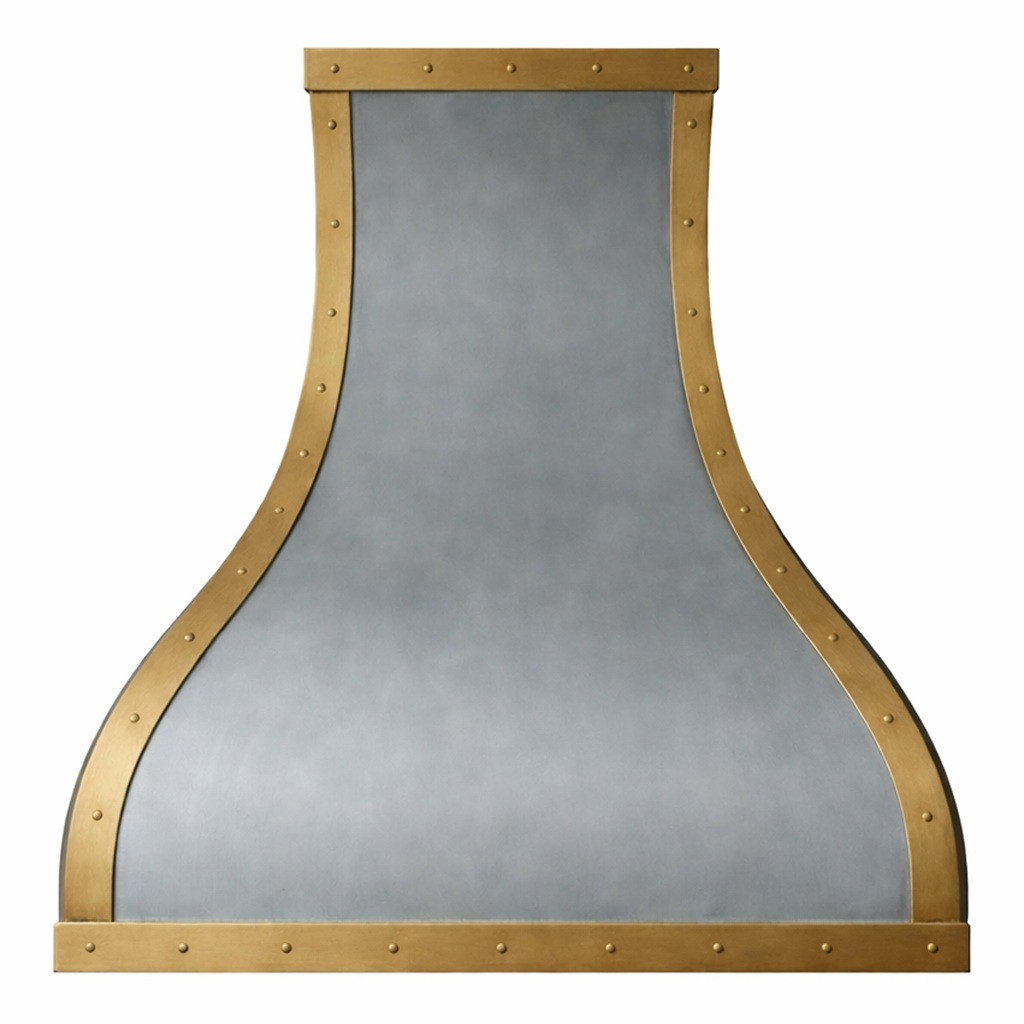 Front view of a zinc range hood with decorative brass corners and straps