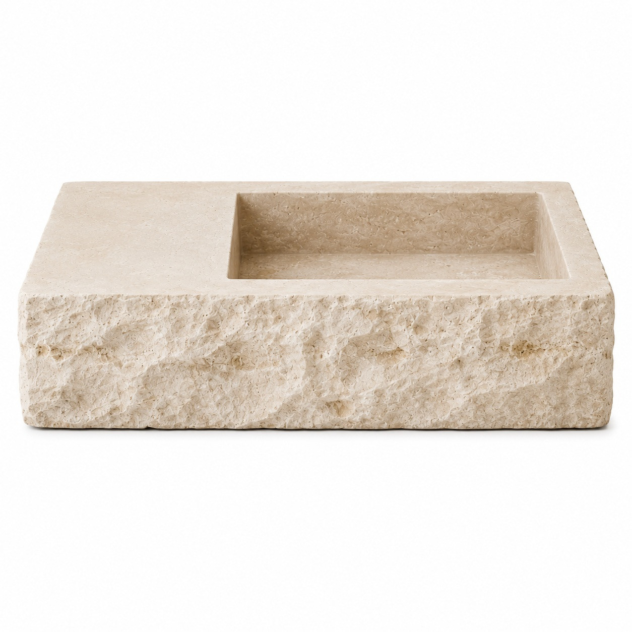 Handcrafted cantera stone sink front view on white background with rough exterior and square basin