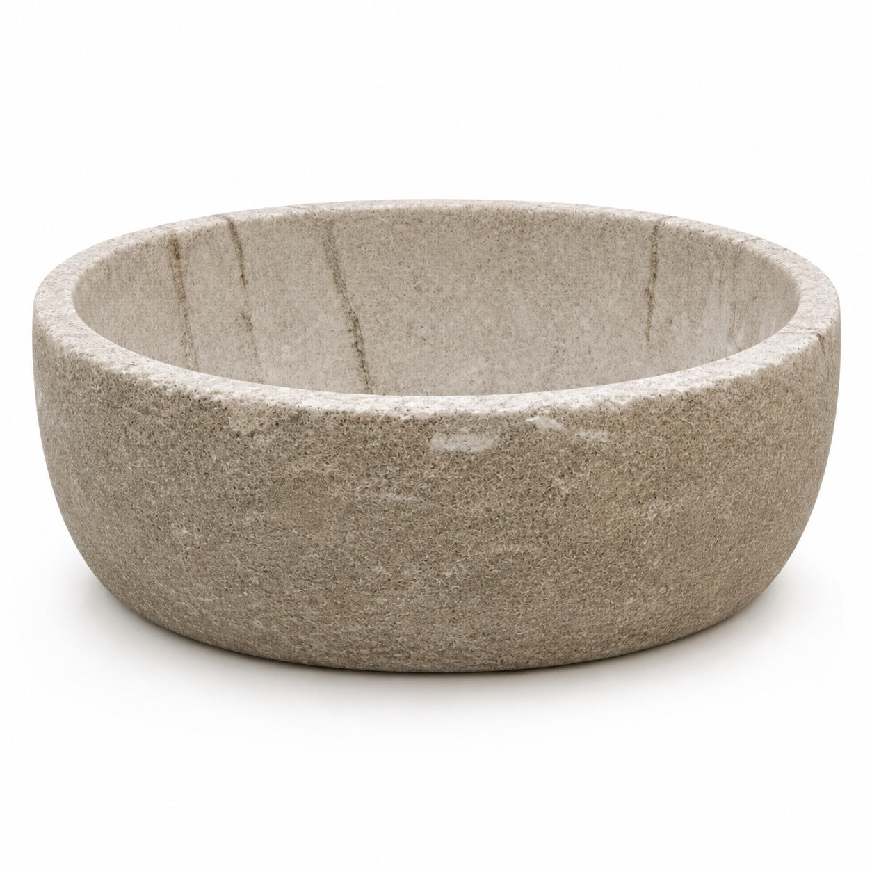 Oval cantera stone bathroom vessel sink with matte texture, rounded rim, and natural beige gray grain