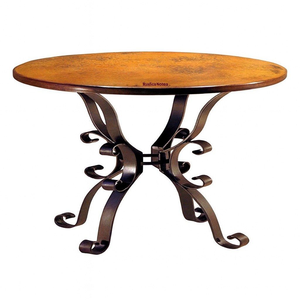 Traditional copper dining table with curved iron base with a round tabletop