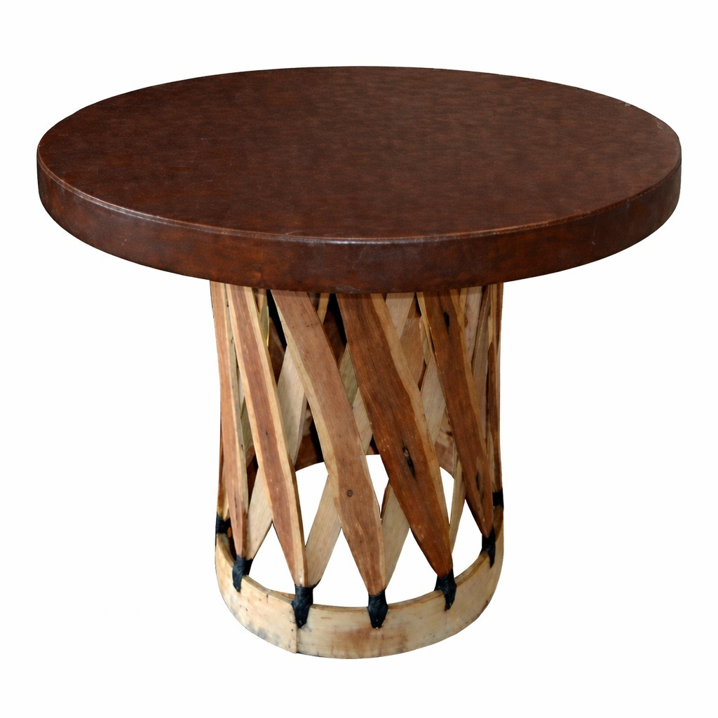Round equipal table with a dark tobacco pigskin top