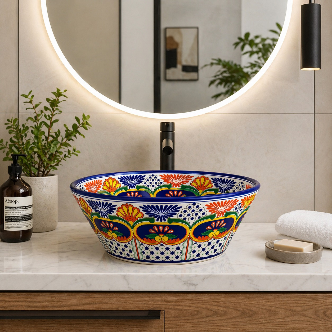Floral talavera round bath cone shape vessel sink in modern bathroom with clean lines and bright interior space