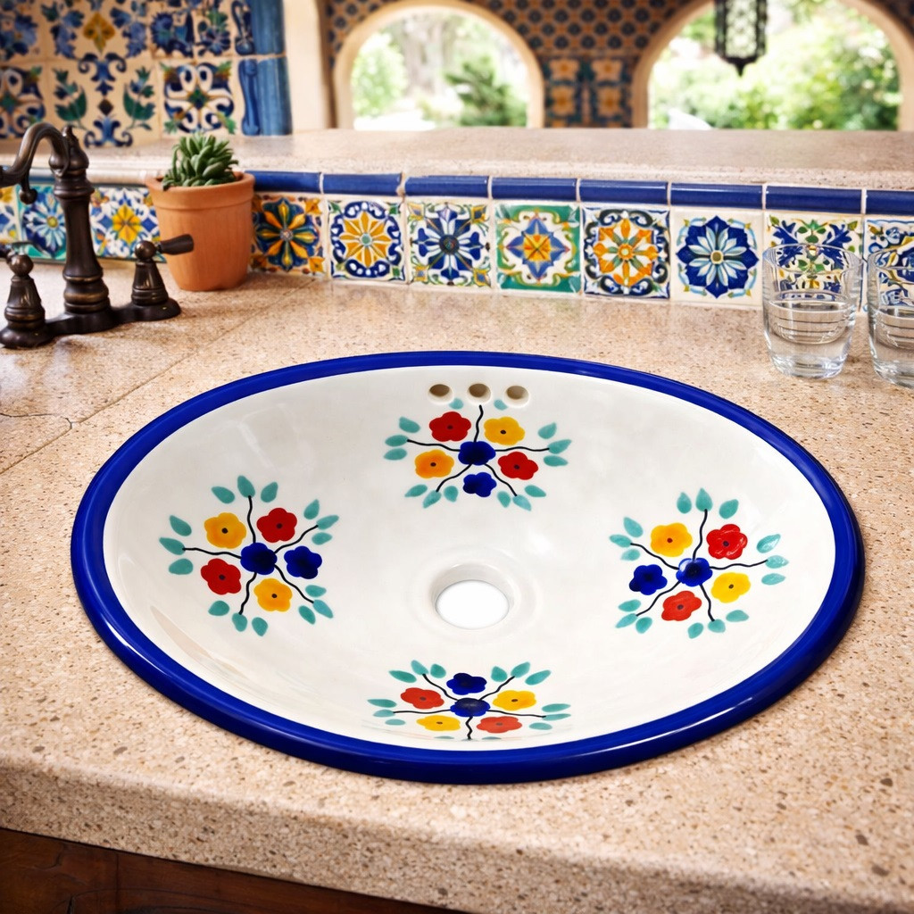 Oval talavera floral cobalt mexican bathroom sink set into a Mediterranean kitchen bar with tiled backsplash