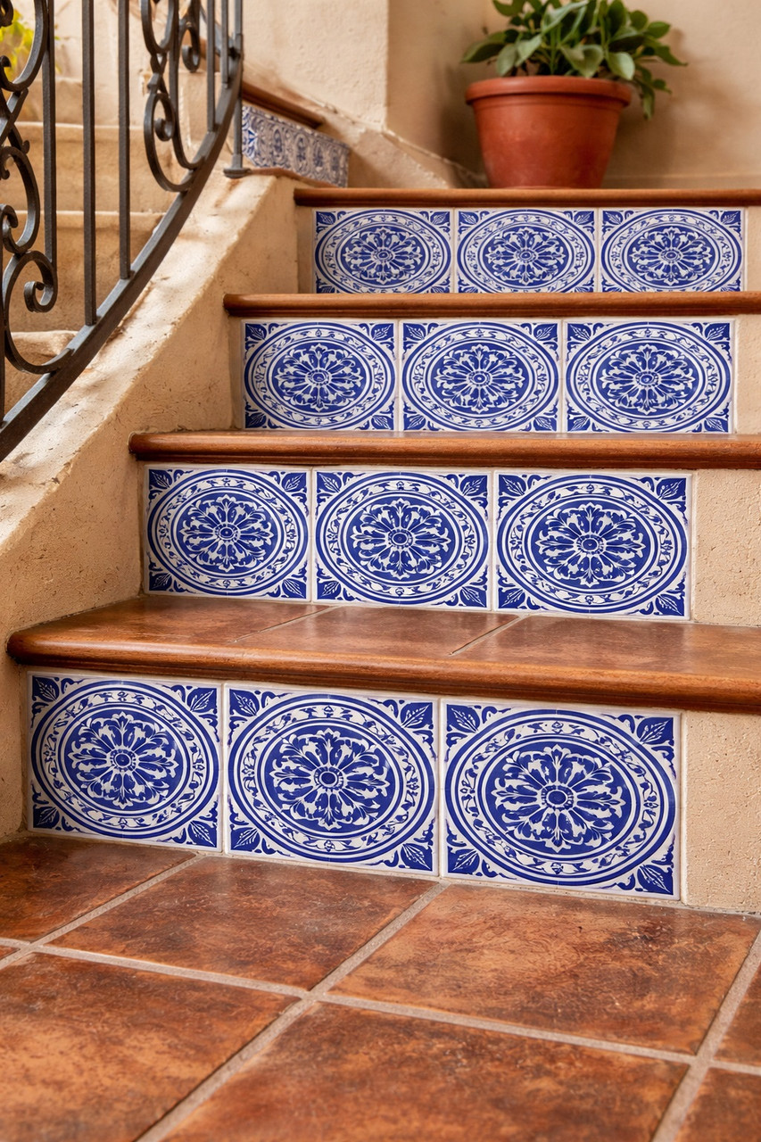 Blue medallion talavera tile decorating a stair riser bringing handcrafted detail to a colonial interior